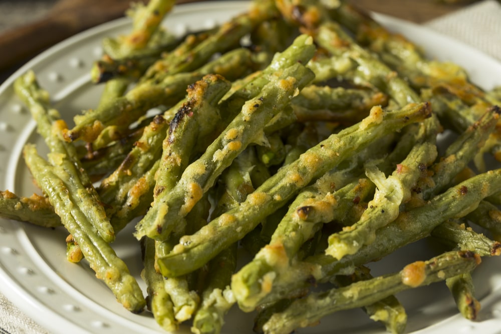 Garlic and parmesan green bean side dish for Thanksgiving.