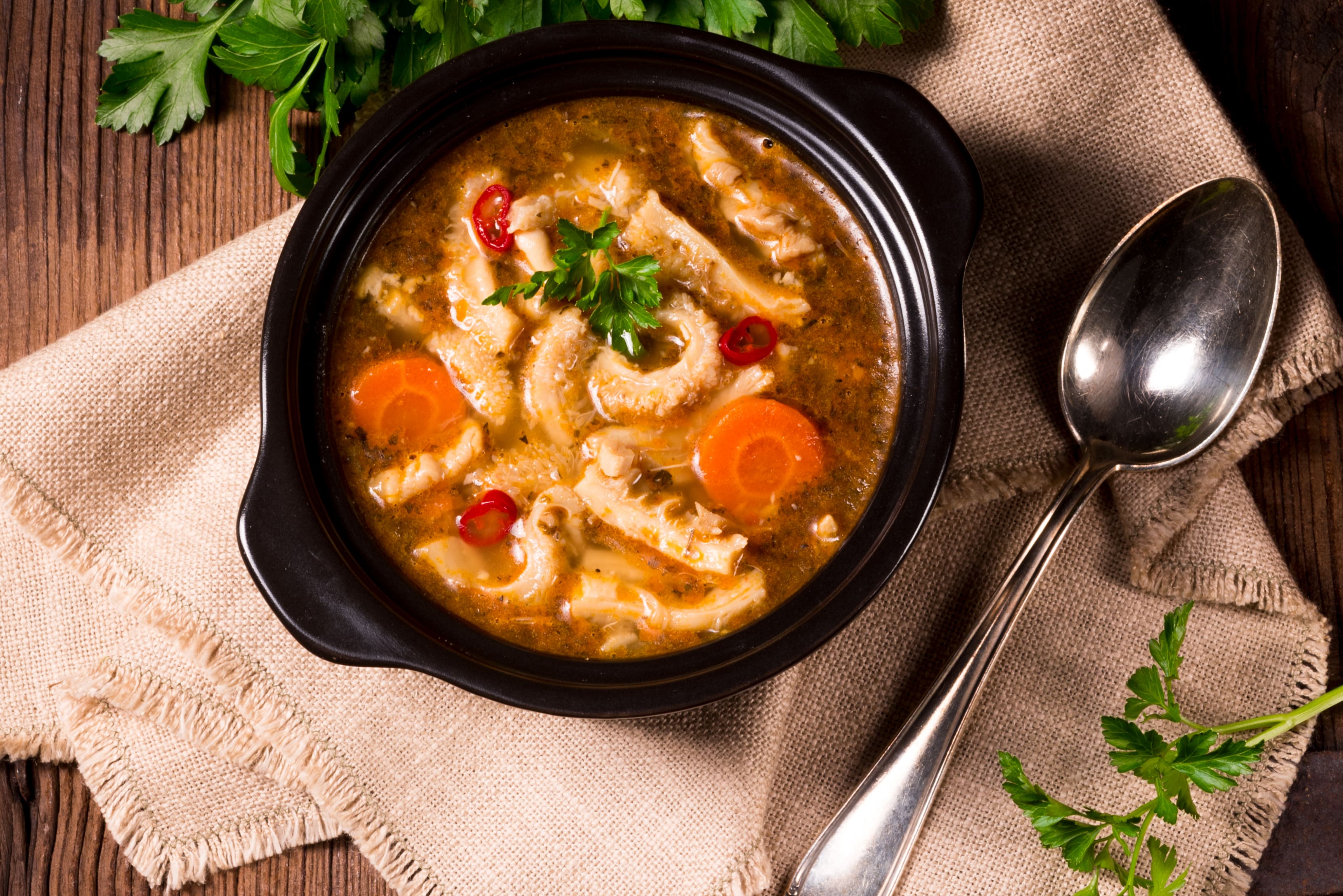 Bowl of soup with leftover turkey and sweet potato